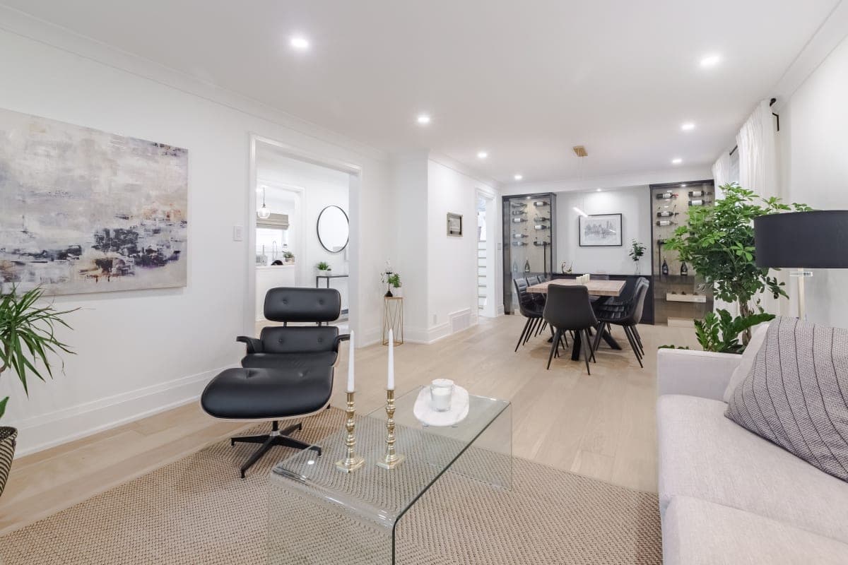 Open-concept living room renovation with hardwood flooring