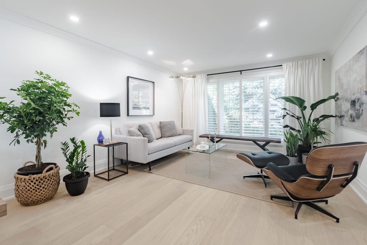 Modern living room renovation by Pavcon Homes