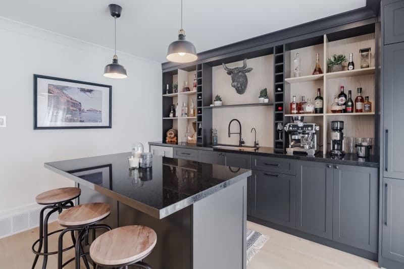 Wet bar renovation with tile backsplash and floating shelves